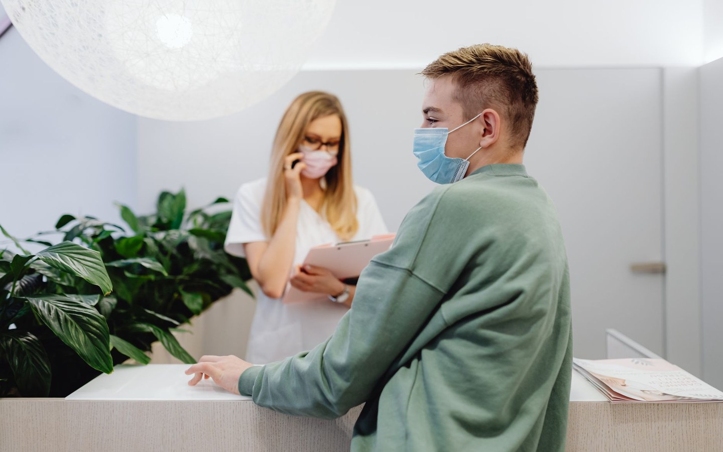 Medical clinic reception area with appointment scheduling