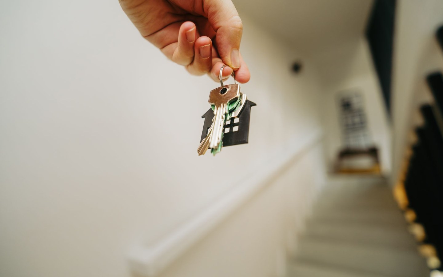 Letting agent with property keys at a rental viewing